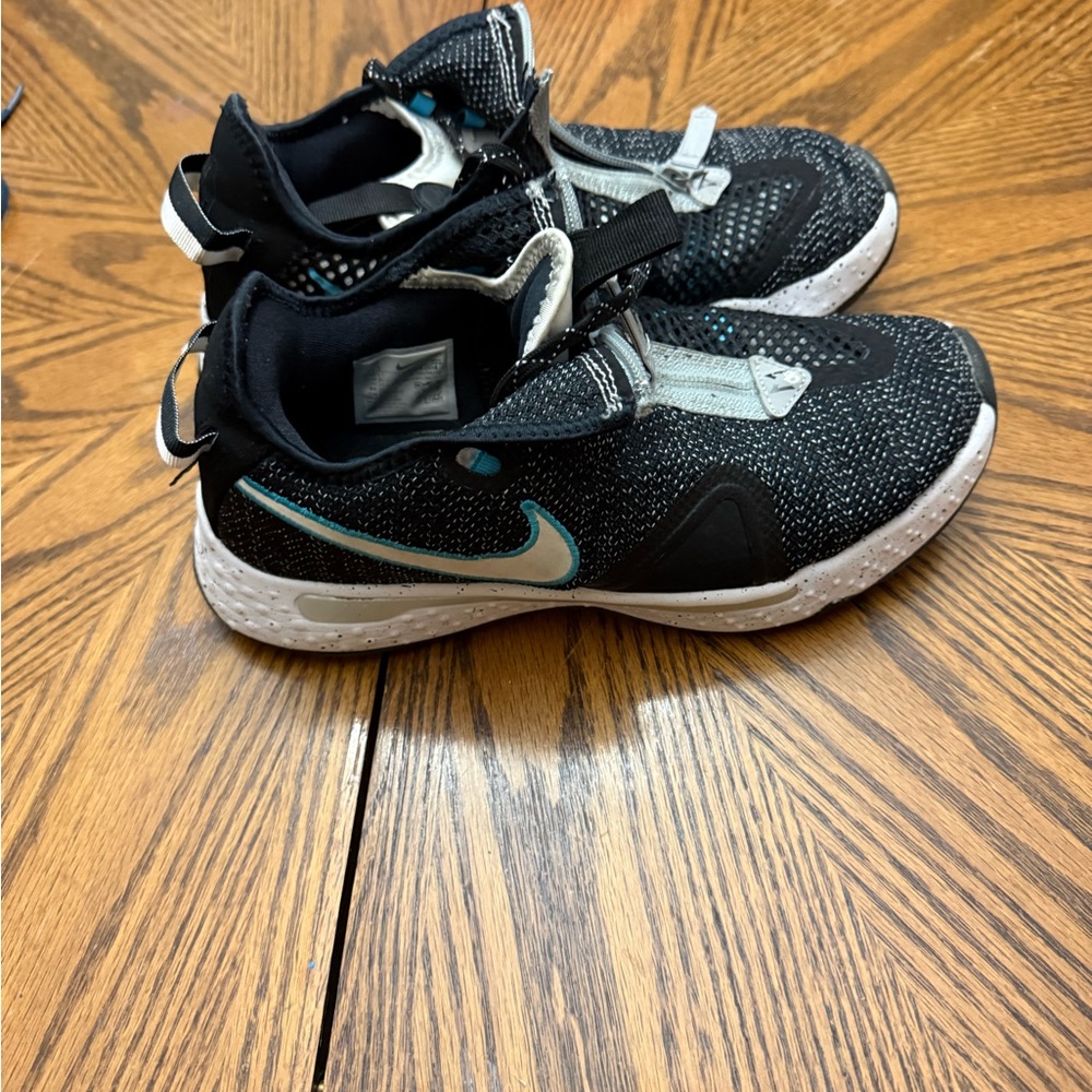 Nike Black and White and Blue Athletic Shoes